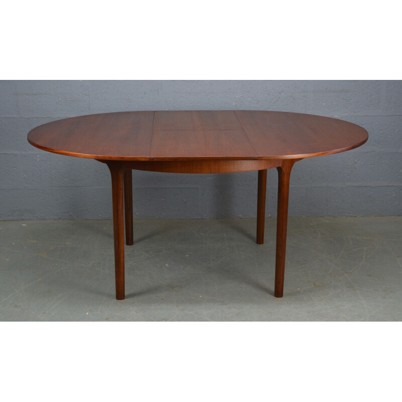 Vintage dining set with round teak dinning table and 4 chairs