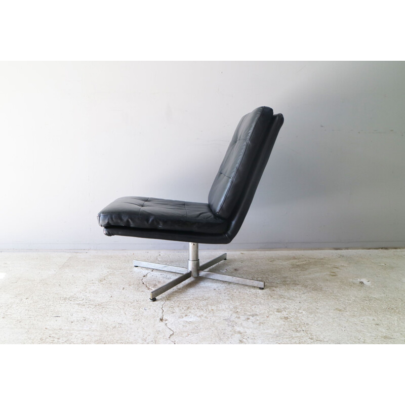 Fauteuil lounge vintage pivotant en cuir , 1960