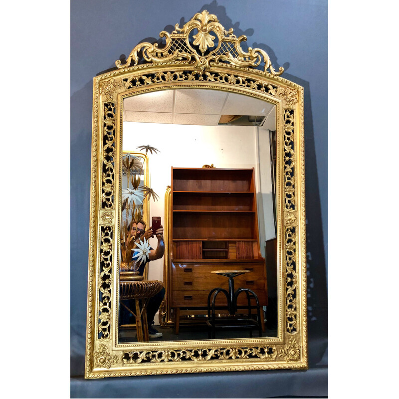 Large vintage mirror in wood with gold leaf