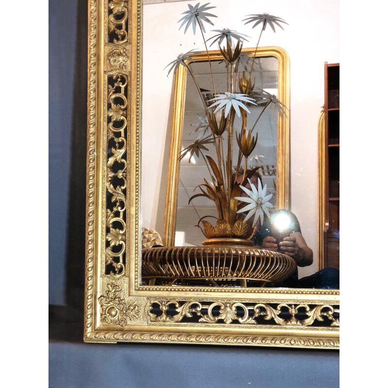 Large vintage mirror in wood with gold leaf