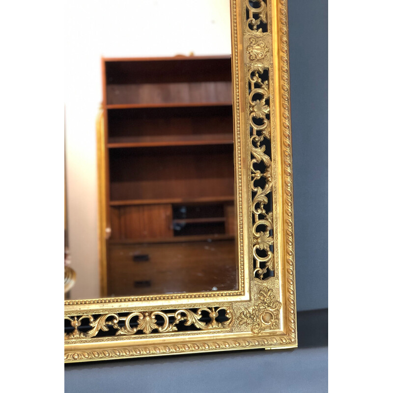 Large vintage mirror in wood with gold leaf