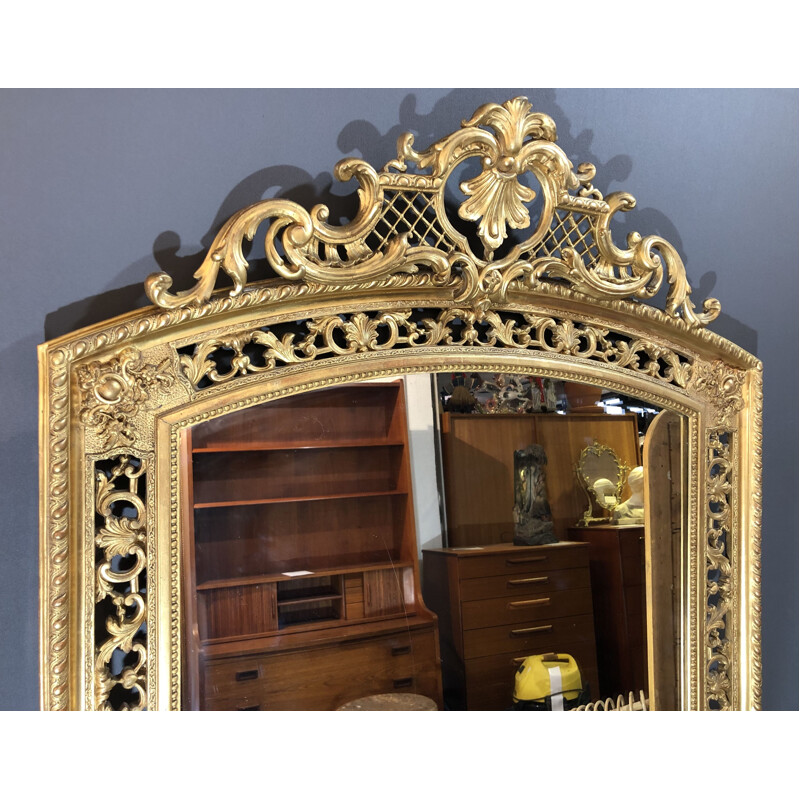 Large vintage mirror in wood with gold leaf