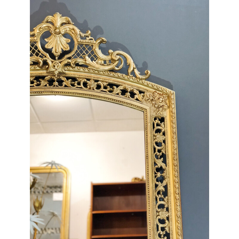 Large vintage mirror in wood with gold leaf