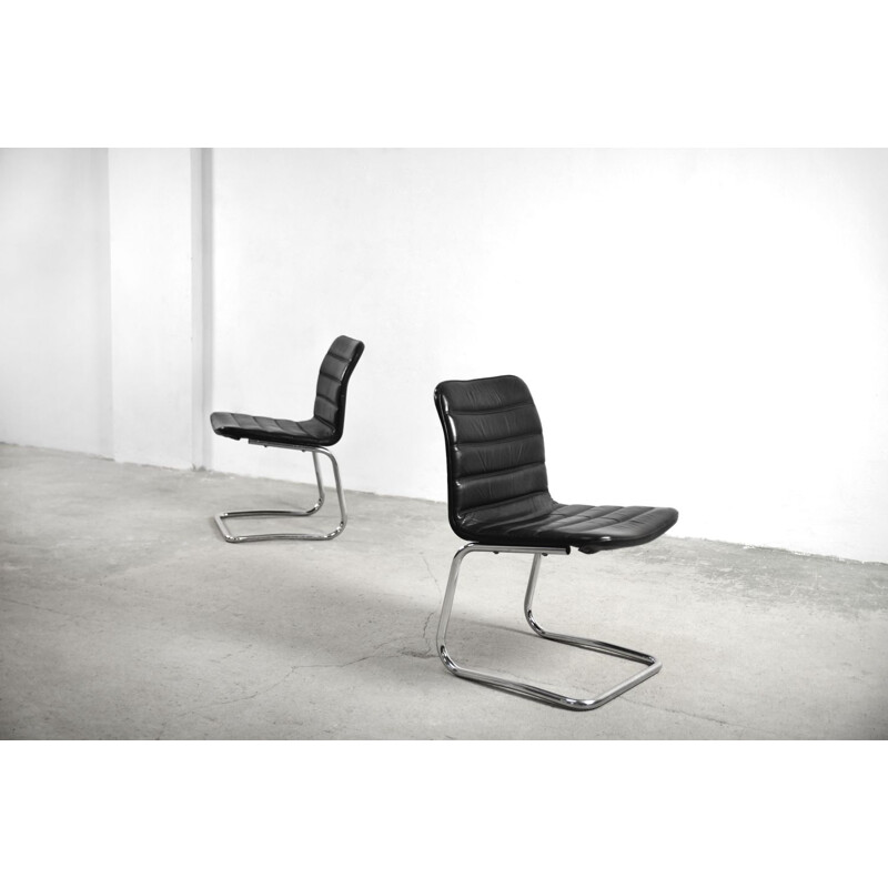 Pareja de sillones minimalistas de cuero vintage de Pol International, Alemania 1960