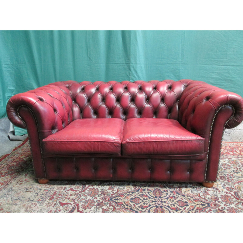 Vintage 2-seater chesterfield sofa in red leather