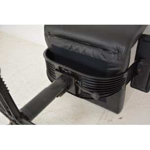 Vintage deskchair swivelling on wheels, in black leather