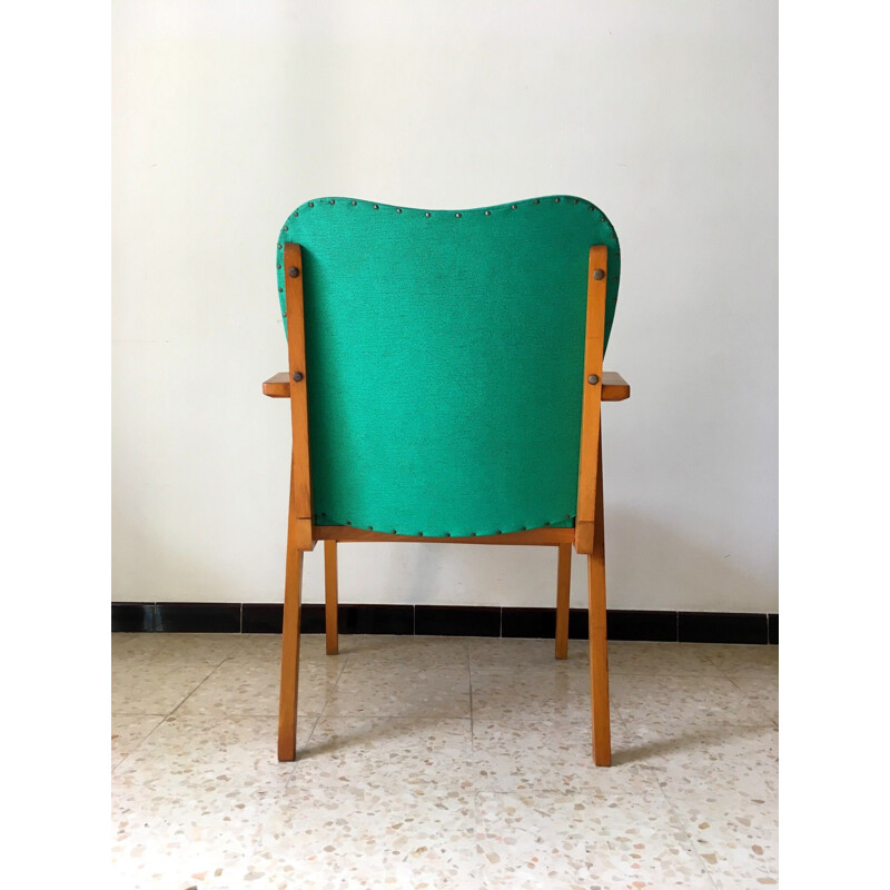 Vintage wooden and green vinyl armchair with compass feet, 1950