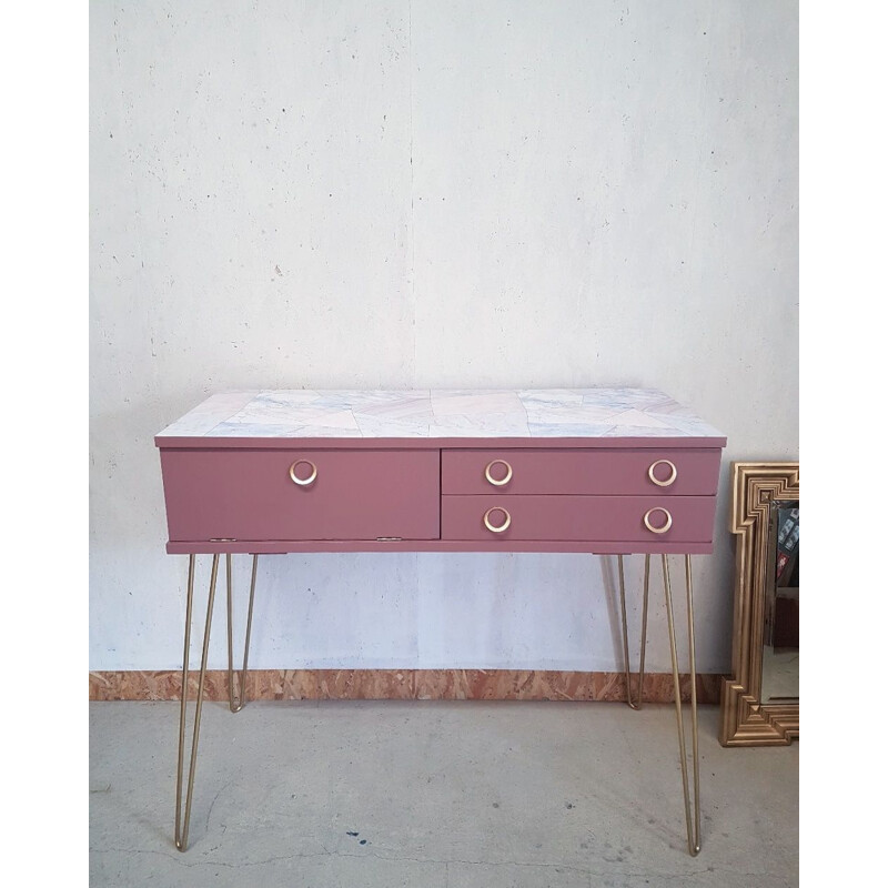 Pink vintage console with compass feet