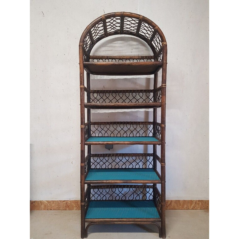 Vintage rattan shelf with geometric blue patterns