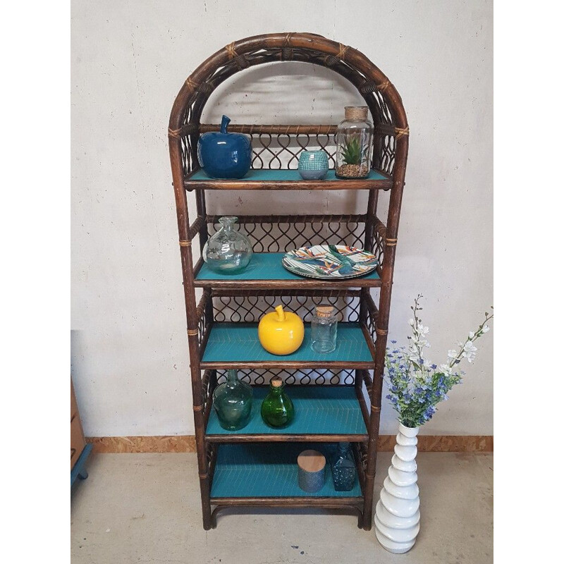 Vintage rattan shelf with geometric blue patterns