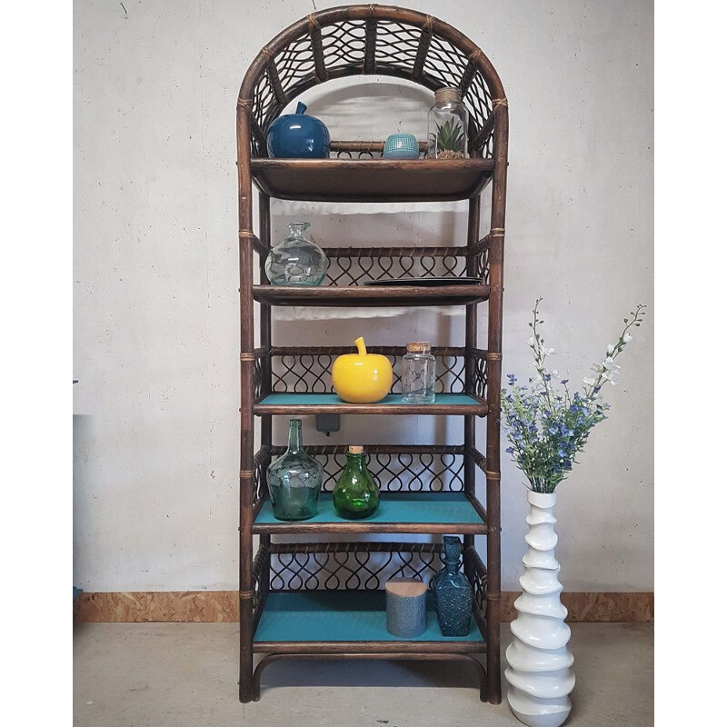 Vintage rattan shelf with geometric blue patterns