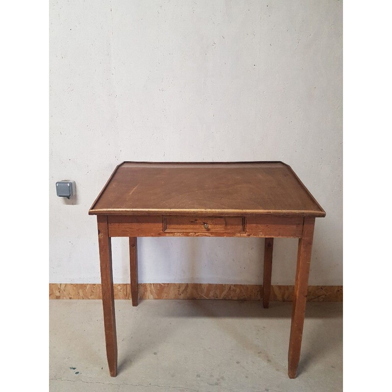 Vintage sloping wooden desk