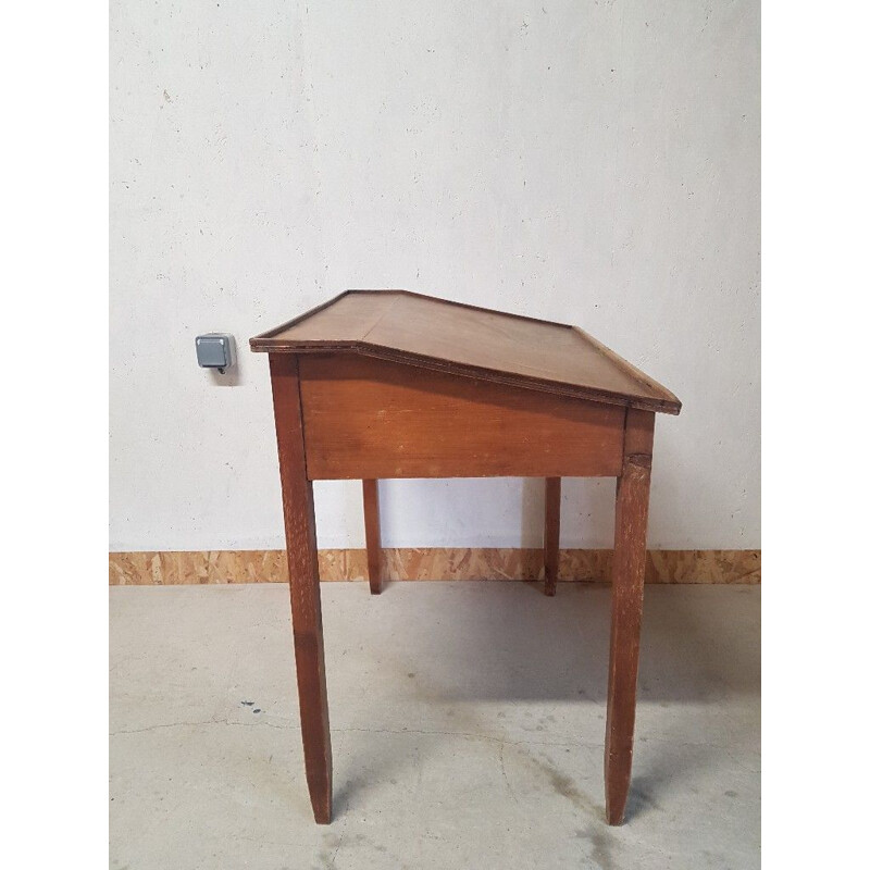 Vintage sloping wooden desk