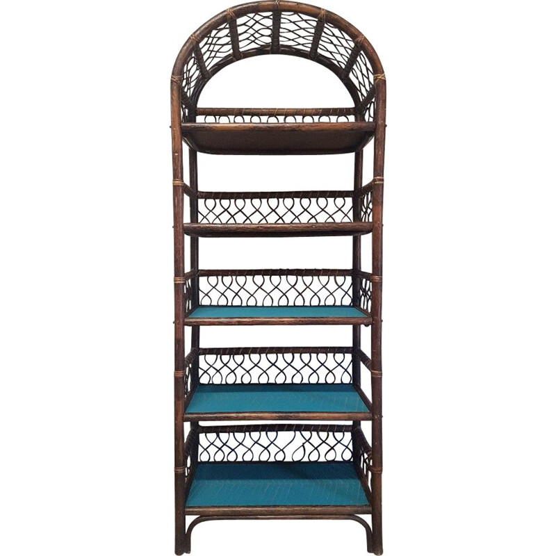 Vintage rattan shelf with geometric blue patterns