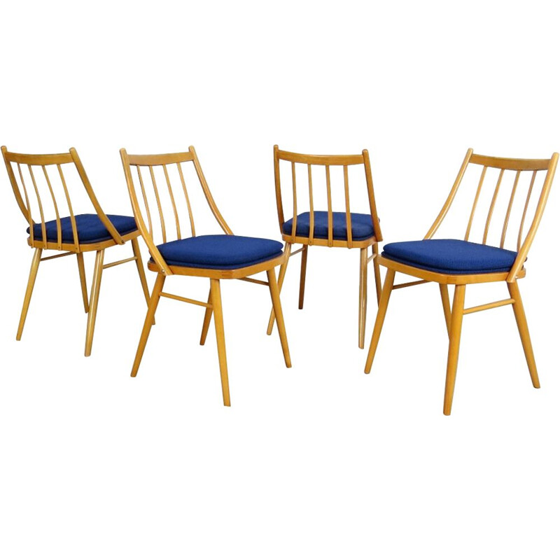 Suite de 4 chaises à repas avec tissu bleu