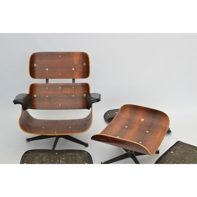 Vintage lounge chair & ottoman in rosewood by Herman Miller, 1963