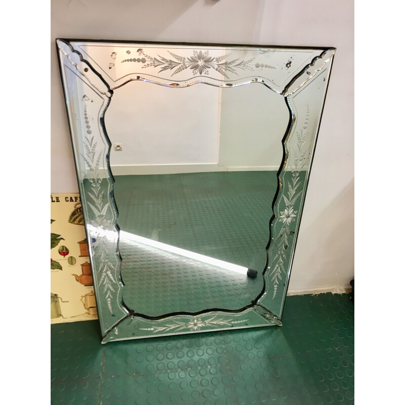 Venetian vintage wooden mirror with floral patterns