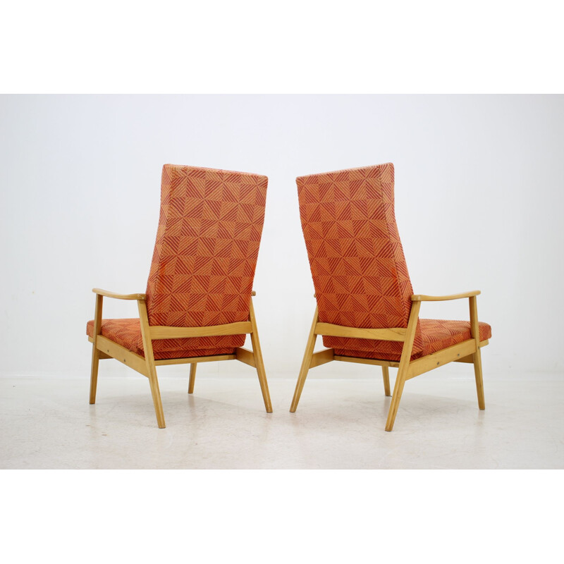 Vintage pair of adjustable armchairs with footstools by Thon, 1970.