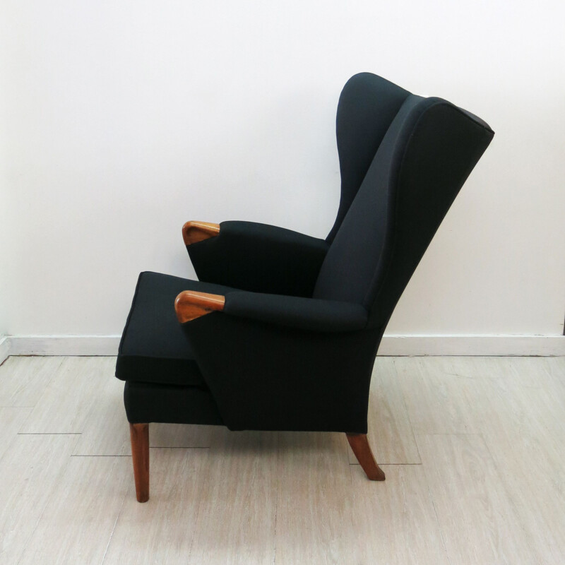 Vintage black wingback chair with teak legs from Parker Knoll, 1960