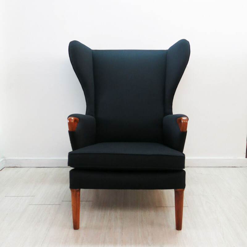Vintage black wingback chair with teak legs from Parker Knoll, 1960