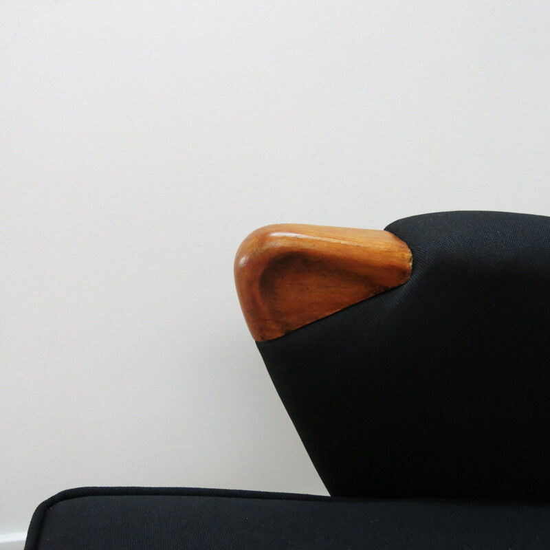 Vintage black wingback chair with teak legs from Parker Knoll, 1960