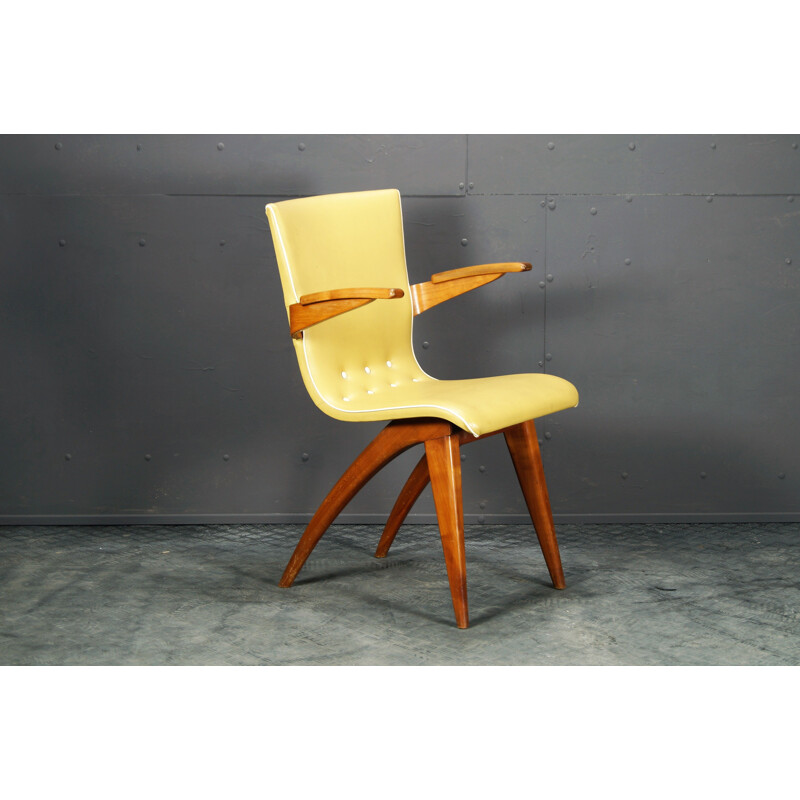 Vintage yellow mahogany and skai chair by C.J. van Os