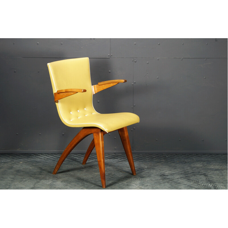 Vintage yellow mahogany and skai chair by C.J. van Os