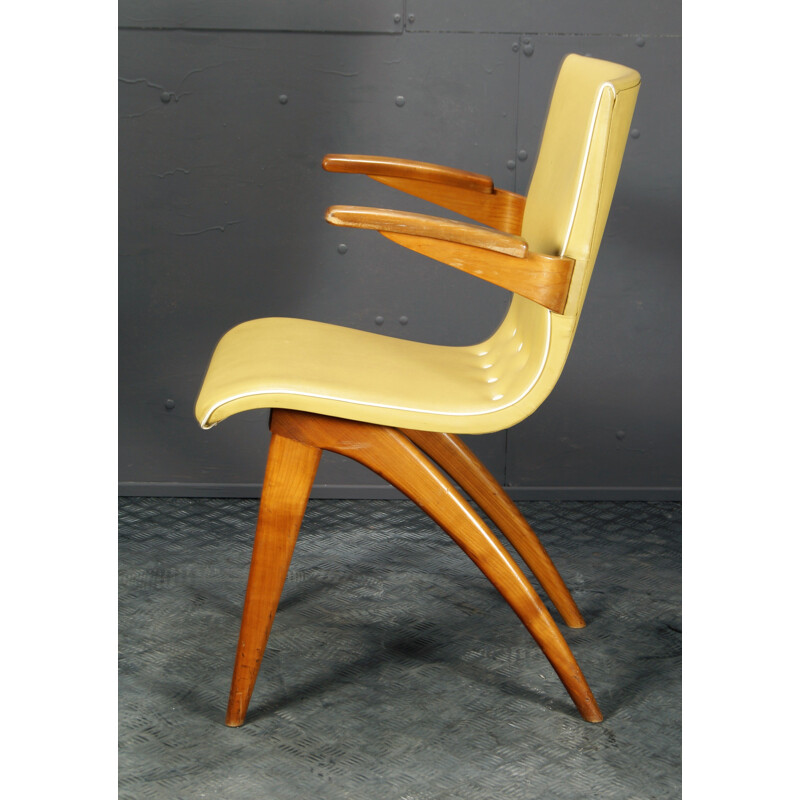Vintage yellow mahogany and skai chair by C.J. van Os