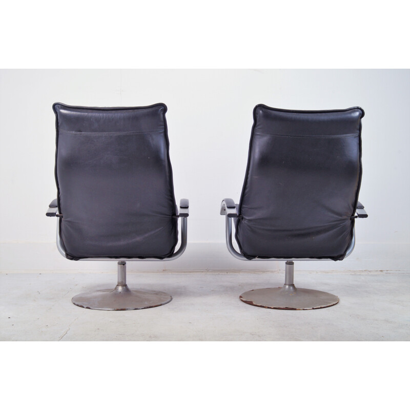 Ensemble de 2 fauteuils vintage en cuir industriel brut