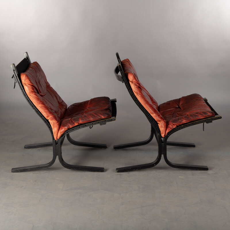 Set of 2 vintage red leather armchairs by Ingmar Relling for Westnofa, 1970s