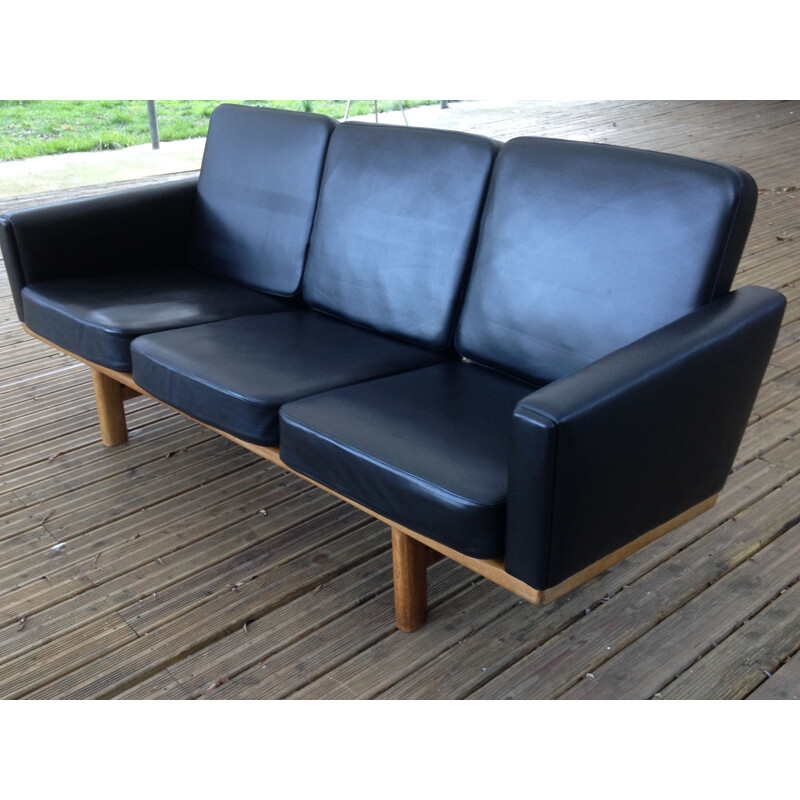 Vintage black leather sofa by H.J.Wegner for Getama