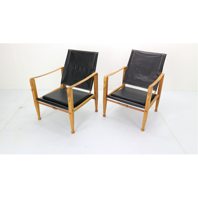 Pair of black leather safari chairs by Kaare Klint for Rud Rasmussen, 1950