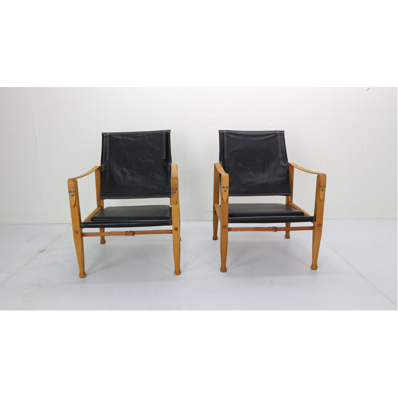 Pair of black leather safari chairs by Kaare Klint for Rud Rasmussen, 1950