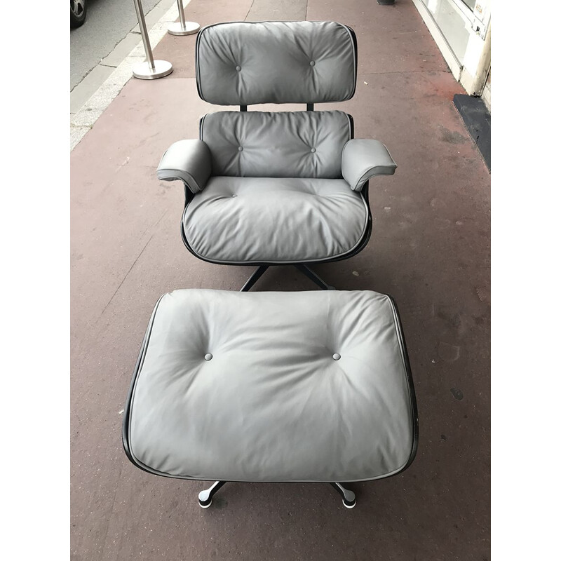 Lounge chair et son ottoman vintage en Cuir gris et frêne noir par Charles Eames pour Herman Miller, Circa 1974