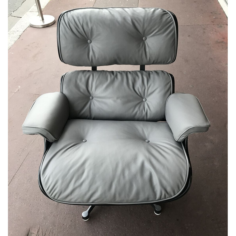 Lounge chair et son ottoman vintage en Cuir gris et frêne noir par Charles Eames pour Herman Miller, Circa 1974