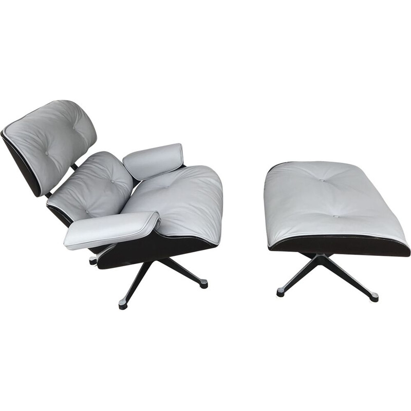 vintage Lounge chair and its Ottoman in Grey Leather and Black Ash by Charles Eames for Herman Miller, Circa 1974