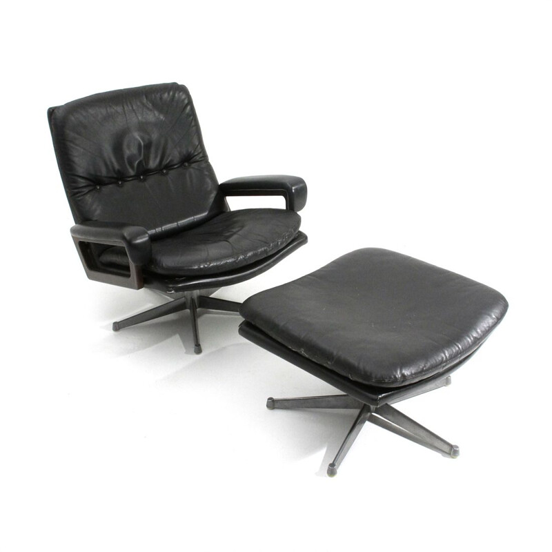 Vintage "King" armchair with ottoman in black leather by André Vandenbeuck for Strässle, 1960s