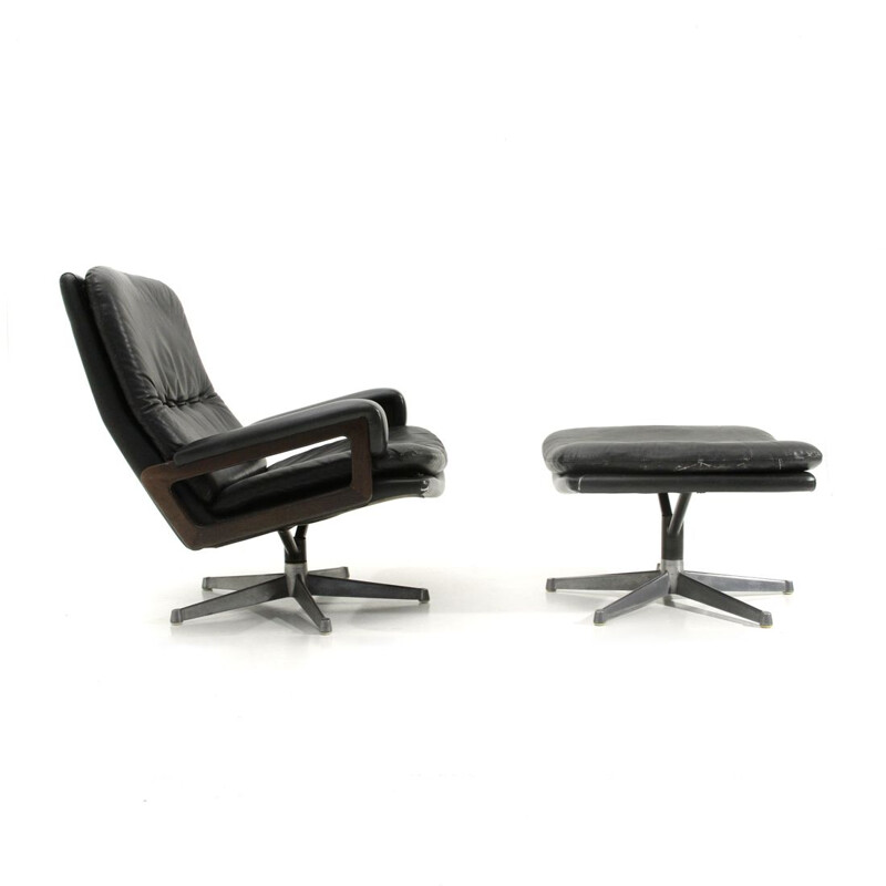 Vintage "King" armchair with ottoman in black leather by André Vandenbeuck for Strässle, 1960s