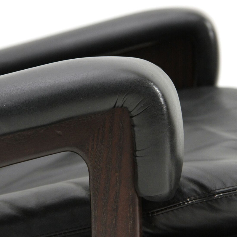 Vintage "King" armchair with ottoman in black leather by André Vandenbeuck for Strässle, 1960s
