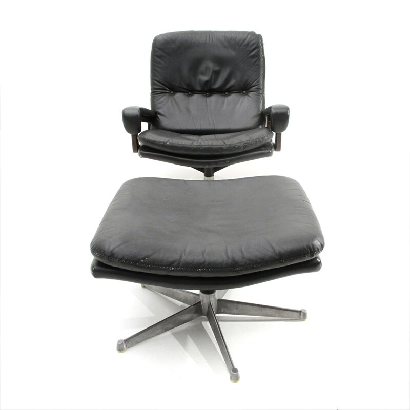 Vintage "King" armchair with ottoman in black leather by André Vandenbeuck for Strässle, 1960s