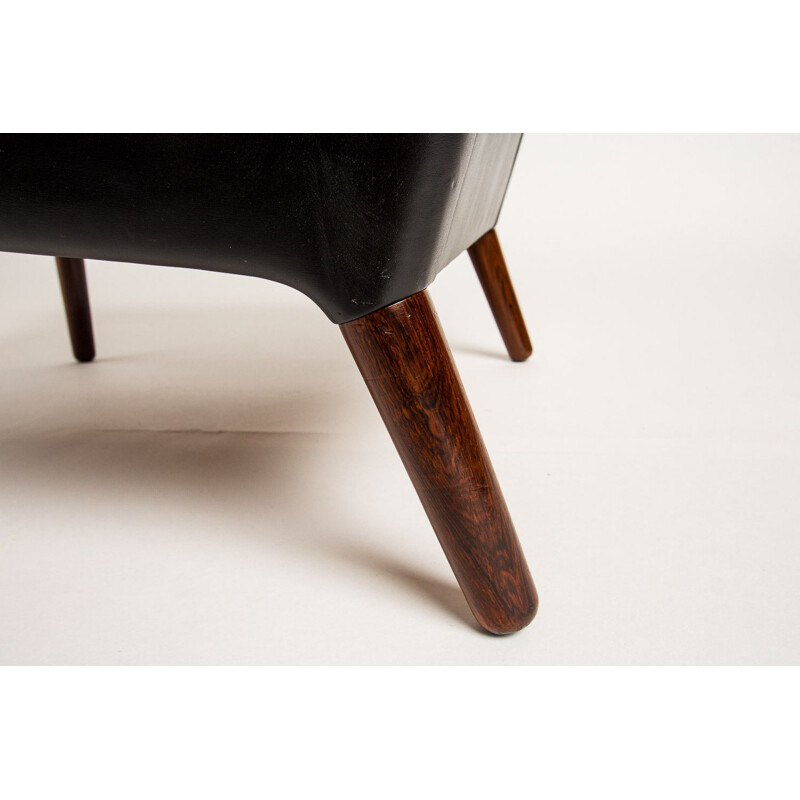 Vinatage chair in leather and rosewood by Kurt Ostervig Danish 1950