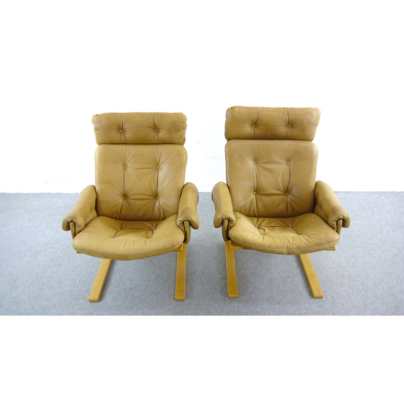 Set of 2 vintage Kengu armchairs in brown leather by Solheim from Rykken, Norway, 1970s