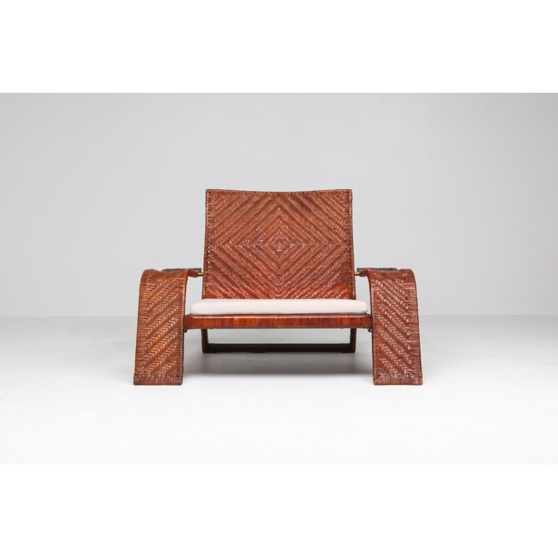Vintage lounge chair In woven leather by Marzio Cecchi 1970