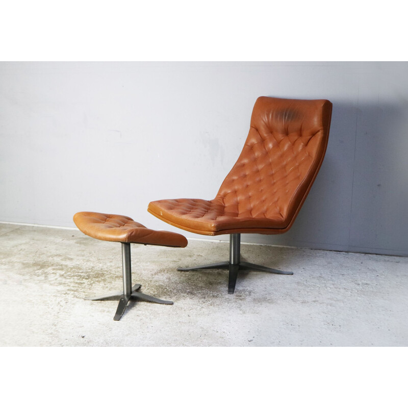 Danish leather vintage armchair and footstool, 1970s