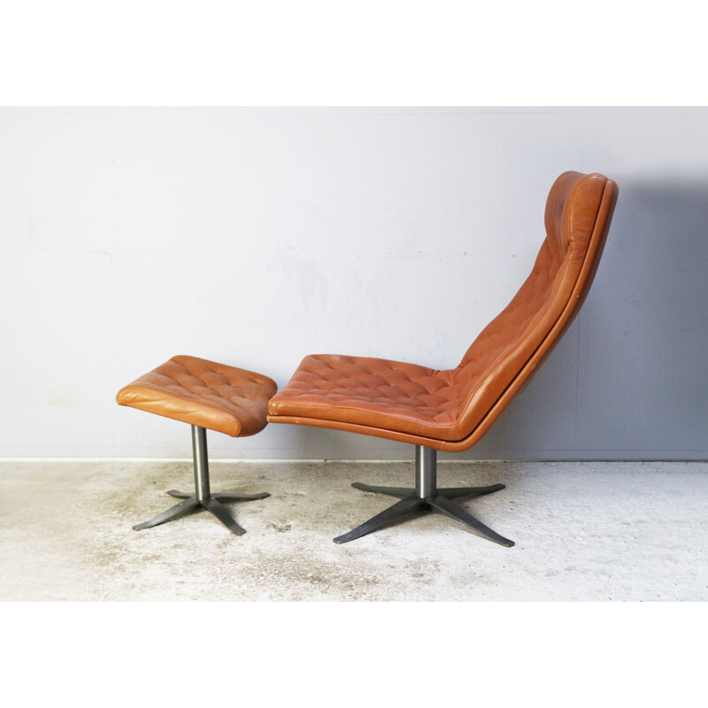 Danish leather vintage armchair and footstool, 1970s