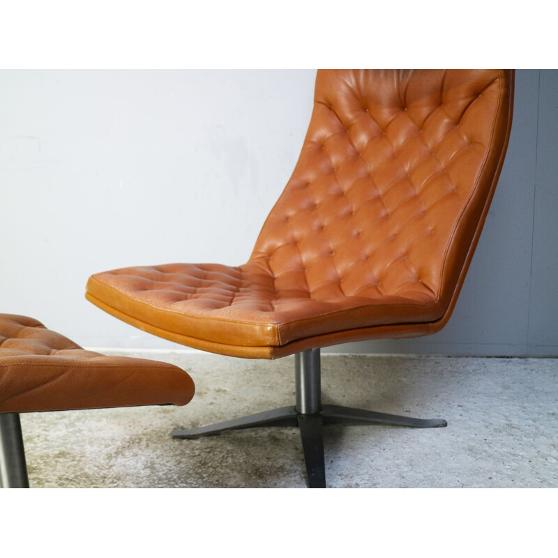 Danish leather vintage armchair and footstool, 1970s