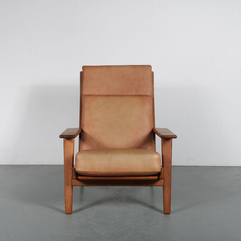 Vintage oak lounge chair  designed by Hans J. Wegner, manufactured by Getama 1950