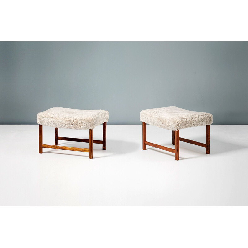 Pair of rosewood and leather stools by Ole Wanscher, 1950s