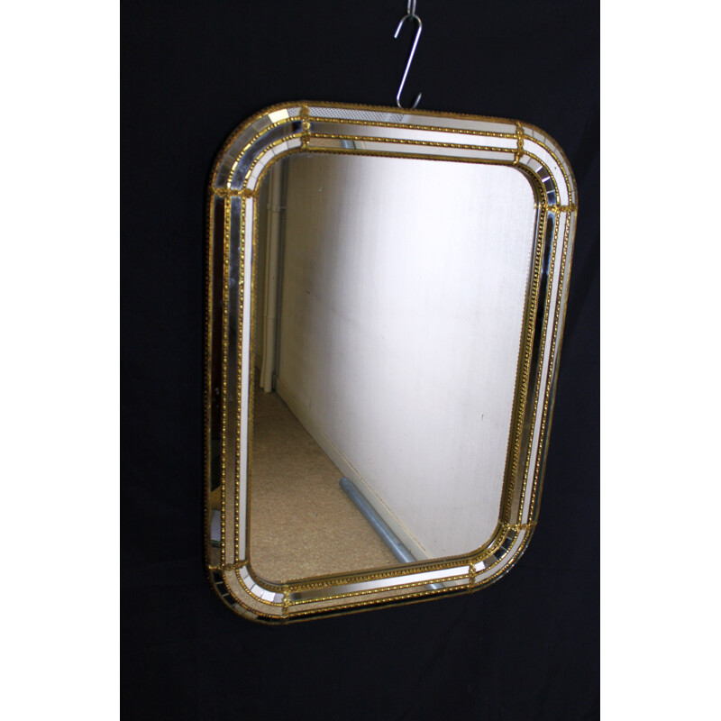 Vintage mirror with facets and galzing bead in gilded brass
