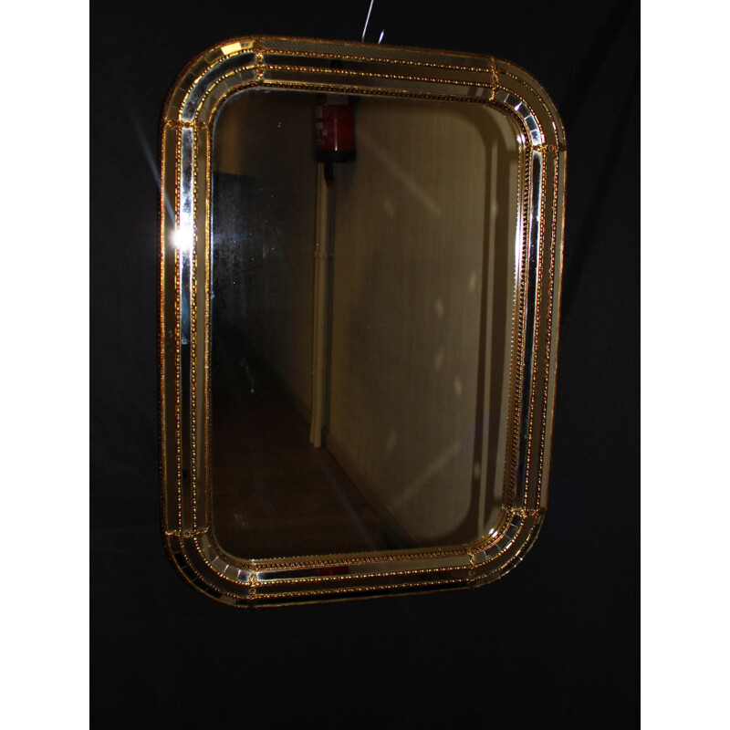 Vintage mirror with facets and galzing bead in gilded brass